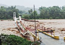 ILOILO LANDSLIDES, FLOODS WREAK HAVOC | Senior citizen killed; 110 Ilonggos displaced A landslide triggered by relentless rains brought by the southwest monsoon engulfs part of a residential area in Barangay Nagba, Tubungan, Iloilo on Sunday, July 12, killing a 67-year-old resident and underscoring the dangers posed by rain-soaked slopes. PHOTO FROM JUNJUNSKIE / TUBUNGAN PNP FACEBOOK PAGE