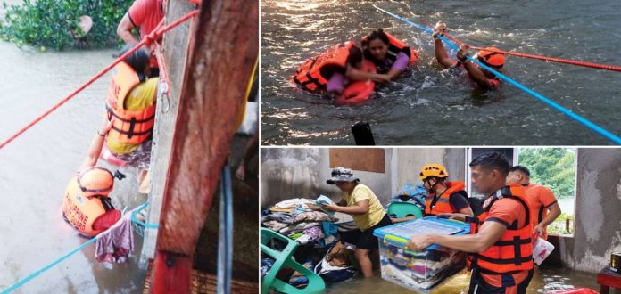 RESCUE FROM RISING WATERS. Members of the Philippine Coast Guard Station Antique’s Deployable Response Team evacuate 10 residents trapped inside their homes as floodwaters rise in Barangay Funda, Hamtic, Antique on Friday, July 24. Hamtic is among the areas identified as vulnerable to flooding and rain-induced landslides. PHOTOS BY SN1 SURIAGA/COAST GUARD STATION ANTIQUE