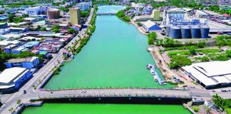 An aerial shot of the Iloilo River shows its calm and clean waters flowing past the Esplanade and surrounding commercial establishments. The Iloilo City Government is stepping up inspections on local establishments along the river to ensure strict compliance with wastewater regulations after improper grease disposal was reported. PHOTO COURTESY OF MAYO RAISA TREÑAS FACEBOOK PAGE