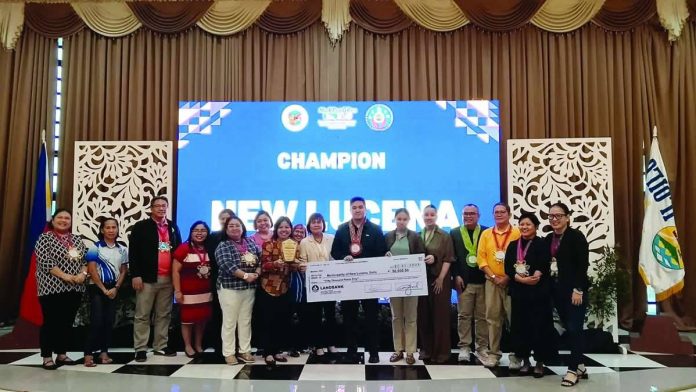INCLUSION CHAMPION. New Lucena, Iloilo’s Mayor Carl Vincent Mondejar and the municipality’s delegation receive a P50,000 cash prize and plaque after New Lucena was named Iloilo province’s Most Persons with Disabilities-Friendly Municipality/City during an awarding ceremony at Casa Real de Iloilo. The town bested nine other municipalities for its disability-inclusive policies, programs, services and facilities. IME SORNITO/PN