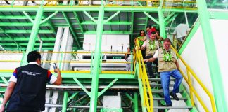 Agriculture Secretary Francisco Tiu Laurel Jr. leads the inauguration of a P347-million modern post-harvest processing facility in Dumangas, Iloilo. This consists of an eight- to 10-ton-per-hour capacity multi-pass rice mill and four 30-ton-per-batch mechanical grain dryers. BALITA HALIN SA KAPITOLYO