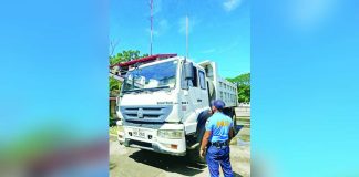 A police officer of Lambunao, Iloilo inspects a dump truck impounded during a recent crackdown on illegal quarry operations. The campaign aims protect Iloilo’s natural resources while promoting responsible and legitimate quarry operations. LAMBUNAO MPS PHOTO