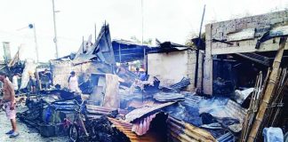Residents inspect what remains of their homes and properties in Barangay Muelle Loney, City Proper district after a fire broke out early Monday morning, July 25, 2026. PHOTO COURTESY OF DYRP LIFE RADIO ILOILO
