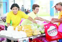 ₱20.8-M FOOD SALES BOOST LIVELIHOODS; ‘Walang Gutom’ program fuels Iloilo-based rural enterprises FOOD FOR FAMILIES, LIVELIHOODS FOR COMMUNITIES. Beneficiaries of the Department of Social Welfare and Development's Walang Gutom Program redeem food items from accredited Sustainable Livelihood Program Associations (SLPAs) in Iloilo. The initiative generated more than ₱20.8 million in gross sales during the first half of 2026, providing income opportunities for local livelihood groups while helping strengthen food security for nearly 7,000 program beneficiaries. DSWD-6