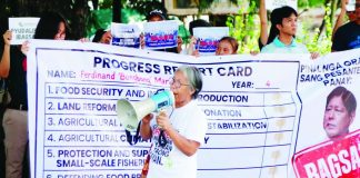 PROGRESS REPORT. Peasant leaders from Panay and Guimaras islands present a symbolic “progress report card”, giving President Ferdinand “Bongbong” Marcos Jr.’s administration failing marks on key agriculture and fisheries issues, including food security, land reform, climate resiliency, protection of small-scale fisheries, and governance.