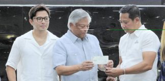 PAGCOR Chairman and CEO Alejandro H. Tengco (center) turns over a P10 million check to Bulacan Governor Daniel Fernando (right) and Vice Governor Alexis Castro for the first tranche of the Ayudang Hatid ay Tagumpay Scholarship Program at the Bulacan Capitol Gymnasium in Malolos City on July 6.