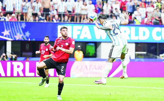 Argentina's Enzo Fernandez celebrates after heading the stoppage-time winner that completed the defending champions' stunning 3-2 comeback victory over Egypt in the FIFA World Cup Round of 16. PHOTO COURTESY OF PLAANTIK