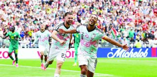 Belgium’s Youri Tielemans celebrates after converting the match-winning penalty in extra time to complete the Red Devils' dramatic 3-2 comeback victory over Senegal in the FIFA World Cup Round of 32. PHOTO COURTESY OF AGUSTIN MARCARIAN/REUTERS