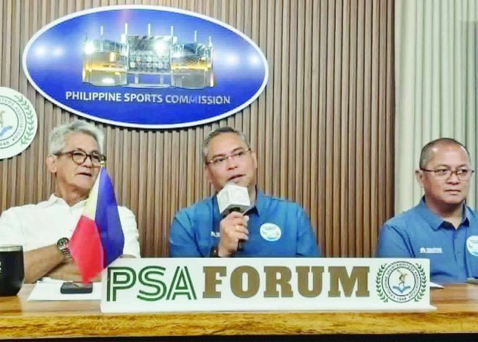 sports_Boracay_copy_compressed_resized Philippine Aquatics Inc. secretary-general Eric Buhain (center) discusses the upcoming 4th Southeast Asian Open Water Championships, which will be held in Boracay Island from Aug. 21 to 23. PSA PHOTO