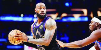 LeBron James celebrates after announcing his move to the Philadelphia 76ers, where the NBA's all-time leading scorer will chase what he says is one final championship in the last chapter of his historic career. PHOTO COURTESY OF IMAGN IMAGES