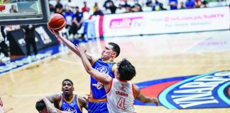 NLEX Road Warriors guard Robert Bolick Jr. stretches for a layup against the defense of Titan Ultra Giant Risers' Shej Roi Sumang during their PBA Season 50 Governors' Cup game at the Ynares Center in Montalban, Rizal. PBA PHOTO