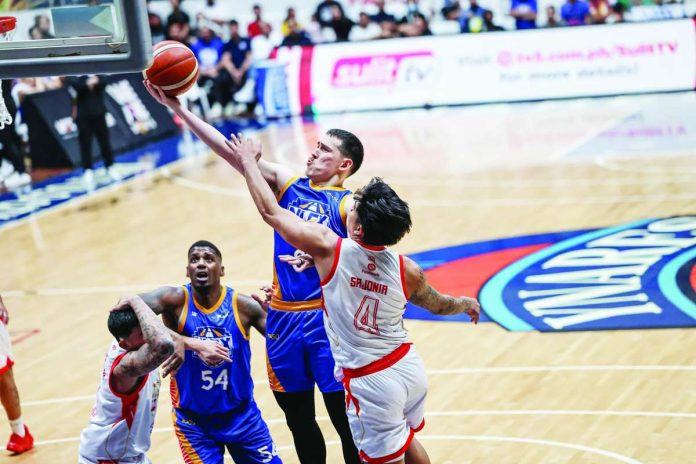 sports_NLEX_compressed_resized NLEX Road Warriors guard Robert Bolick Jr. stretches for a layup against the defense of Titan Ultra Giant Risers' Shej Roi Sumang during their PBA Season 50 Governors' Cup game at the Ynares Center in Montalban, Rizal. PBA PHOTO