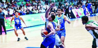NLEX Road Warriors’ Robert Bolick Jr. drives to the basket against the defense of Terrafirma Dyip's Justin Strings during their PBA Season 50 Governors’ Cup clash at the Ynares Center in Montalban, Rizal. PBA PHOTO