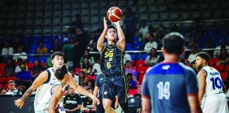 TNT Tropang 5G guard Rey Nambatac pulls up for a three-pointer against the Converge FiberXers in the PBA Season 50 Governors’ Cup. Nambatac later buried a corner triple at the buzzer to give TNT a dramatic 110-107 victory. PBA PHOTO