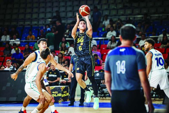 TNT Tropang 5G guard Rey Nambatac pulls up for a three-pointer against the Converge FiberXers in the PBA Season 50 Governors’ Cup. Nambatac later buried a corner triple at the buzzer to give TNT a dramatic 110-107 victory. PBA PHOTO
