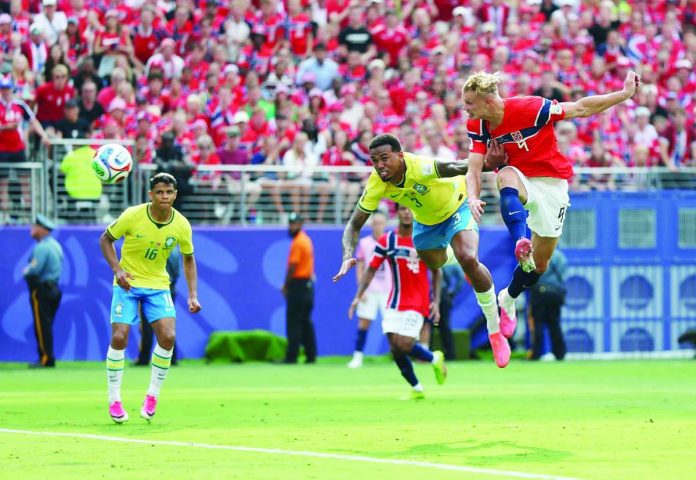 sports_Norway_compressed_resized Norway’s Erling Haaland rises for a header against Brazil during their FIFA World Cup Round of 16 match at MetLife Stadium in East Rutherford, New Jersey. PHOTO COURTESY OF FABRIZIO ROMANO