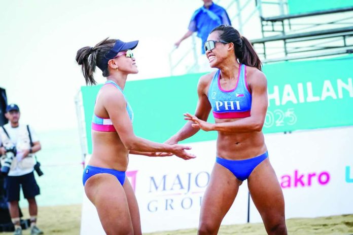 Alas Pilipinas beach volleyball stars Cherry Rondina and Bernadeth Pons celebrate after being named recipients of the Fans' Choice Beach Volleyball Award at the inaugural Asian Volleyball Confederation Gala following their victory in the public voting. SAVA