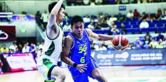 TNT Tropang 5G’s Rey Nambatac attacks the defense of the Macau Giant Pandas during their PBA Season 50 Governors' Cup game at the Smart Araneta Coliseum. PBA PHOTO