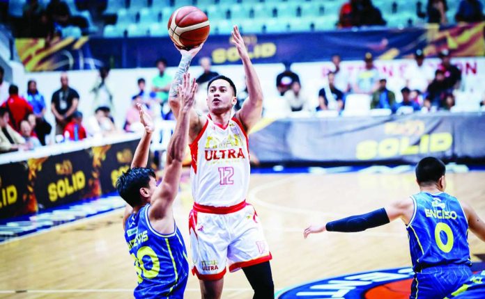 sports_Titan_compressed_resized Titan Ultra Giant Risers' Shej Roi Sumang floats in a runner over the defense during the Giant Risers' upset victory over defending champion TNT Tropang 5G in the PBA Season 50 Governors' Cup on Wednesday at the Ynares Center in Antipolo City. PBA PHOTO