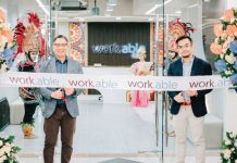 (L-R) Mr. Jericho P. Go, SVP and Business Unit General Manager of Robinsons Offices and work.able landlord, together with Mr. Elton John N. Peralta, Senior Director and Head of work.able, marks the opening of work.able Iloilo with a ceremonial ribbon cutting.