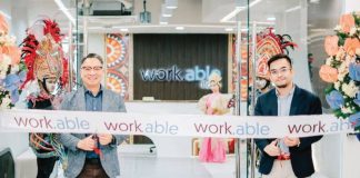 (L-R) Mr. Jericho P. Go, SVP and Business Unit General Manager of Robinsons Offices and work.able landlord, together with Mr. Elton John N. Peralta, Senior Director and Head of work.able, marks the opening of work.able Iloilo with a ceremonial ribbon cutting.