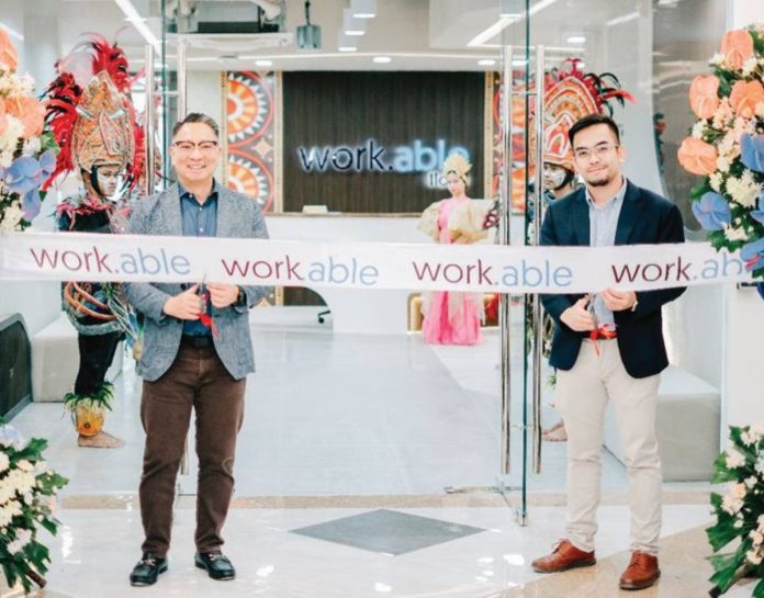 workable1 (L-R) Mr. Jericho P. Go, SVP and Business Unit General Manager of Robinsons Offices and work.able landlord, together with Mr. Elton John N. Peralta, Senior Director and Head of work.able, marks the opening of work.able Iloilo with a ceremonial ribbon cutting.