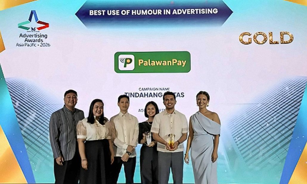 Representatives from the Palawan Group with the awards earned by the campaigns “Tindahang Butas” and “2nd Wallet.”