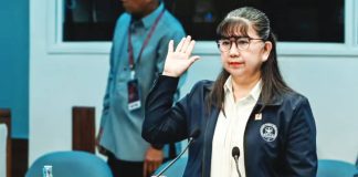 Gina Acosta, former special disbursing officer of the Office of the Vice President, takes her oath before testifying in the impeachment trial of Vice President Sara Duterte-Carpio in the Senate. PHOTO BY NIÑO JESUS ORBETA | INQUIRER