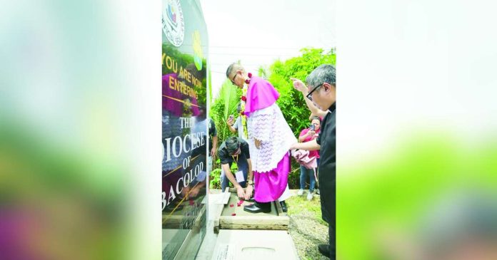 Bacolod bishop copy_compressed_superimposed Bishop Louie Galbines took his ceremonial first step into the Diocese of Bacolod on August 10, 2026, at the Tanolo Bridge along the Bacolod-South Road in Hinigaran, Negros Occidental. The bridge serves as a boundary and transition point between the Dioceses of Bacolod and Kabankalan. DIOCESE OF BACOLOD PHOTO