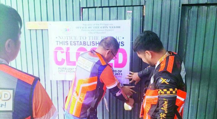 Five more business establishments in Barangay Taculing, Bacolod City, were served closure orders by the Business Permits and Licensing Office and the City Legal Enforcement Unit on August 18 for operating without the required permits. BCCO PHOTO