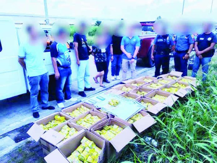 Bacolod_fake_seasonings_copy_compressed_resized CIDG-Bacolod personnel arrested two suspects and displayed boxes and sacks of allegedly counterfeit Maggi Magic Sarap seasoning products seized during an entrapment operation along the Economic Highway in Barangay Mansilingan, Bacolod City, on August 5. The seized products were valued at about P470,400. CIDG-BACOLOD PHOTO