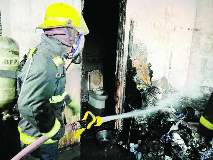 Bacolod_fire_compressed_resized Firefighters worked to contain a blaze that destroyed a two-storey house at Grandville 3, Barangay Mansilingan, Bacolod City, on August 12. The fire caused an estimated P750,000 in property damage but left no reported injuries or casualties. BFP PHOTO