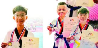 Gold medalists Marms Syrell L. Deocampo, Noah Zion Alcantara, and James Niño Ablao Venancio of the Venancio Taekwondo Academy. VTA VIA CAPIZ TIMES PHOTO