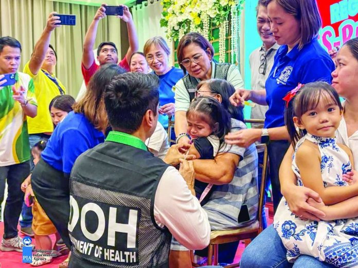Capiz_vaccines_copy_compressed_resized A total of 150 Capiznon children aged 6 to 59 months received the measles-rubella vaccine during the regional launch of the Measles-Rubella Supplemental Immunization Activity at the Circulo Convention Center in Pueblo de Panay, Roxas City, on August 6. The vaccination campaign will run from August 10 to 28 across Western Visayas. PIA-CAPIZ PHOTO