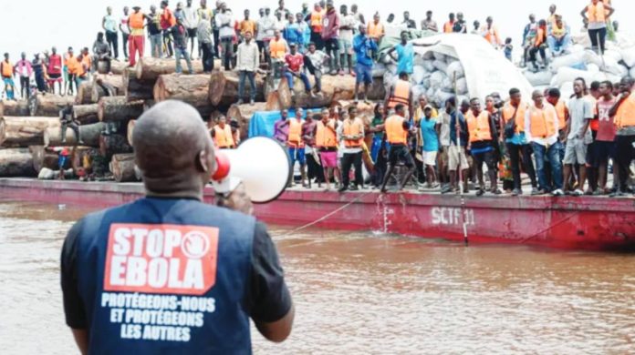 Congo The Yingfeng 2 boat was intercepted on the Congo River before it could reach Kinshasa. A man with a megaphone gives instructions. REUTERS