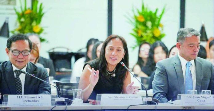 DOE_confident_compressed_resized Energy Secretary Sharon Garin says that out of the 10,000-megawatt (MW) goal, the energy sector would complete 4,100 MW this year. By 2030, the Philippine government hopes to scale renewables share in the electricity generation mix to 35 percent from the current 25 percent. DEPARTMENT OF ENERGY/FACEBOOK PHOTO