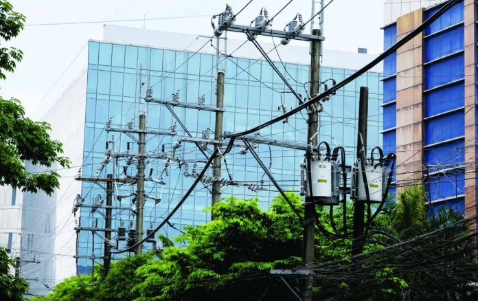 Power lines in parts of Metro Manila in this undated photo. The Department of Energy on Monday, Aug. 24, 2026, said around P7 billion is being considered to fund measures to address system losses, in line with the Marcos administration’s bid to remove charges from electricity not used by consumers. PNA FILE PHOTO