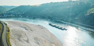 An aerial view as a cargo ship passes a huge exposed sandbar on the Rhine River. The Rhine fell to its lowest ever levels at points in Germany and the Netherlands as heatwave conditions continue. GETTY IMAGES