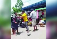 Bystanders and fellow tricycle drivers restrained a tricycle driver after he allegedly punched a traffic enforcer during a confrontation over a roadside parking violation behind Himamaylan Central School in Himamaylan City on August 19. The traffic enforcer is seen on the ground following the alleged assault. The Land Transportation Office–Negros Island Region later served a Show Cause Order on the driver. SCREENGRAB FROM PANAY NEWS DIGITAL
