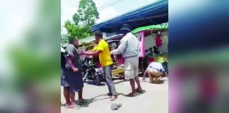 Bystanders and fellow tricycle drivers restrained a tricycle driver after he allegedly punched a traffic enforcer during a confrontation over a roadside parking violation behind Himamaylan Central School in Himamaylan City on August 19. The traffic enforcer is seen on the ground following the alleged assault. The Land Transportation Office–Negros Island Region later served a Show Cause Order on the driver. SCREENGRAB FROM PANAY NEWS DIGITAL
