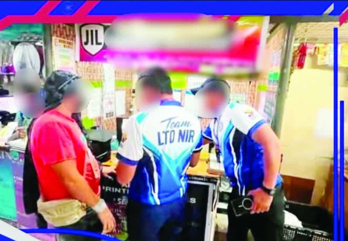 Two persons were arrested by the LTO-NIR in an entrapment operation targeting alleged fixers involved in the issuance and printing of fake driver’s licenses at a shop in downtown Bacolod City on Friday, August 14. LTO-NIR PHOTO