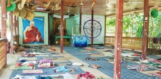 Mats and rugs can be seen on the floor of an open-walled space for meditation at a monastery said to have been targeted in Myanmar. MYAUNG UNION ARMY