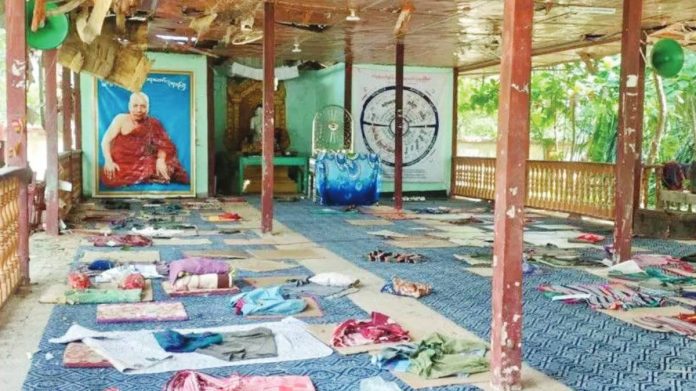 Mats and rugs can be seen on the floor of an open-walled space for meditation at a monastery said to have been targeted in Myanmar. MYAUNG UNION ARMY
