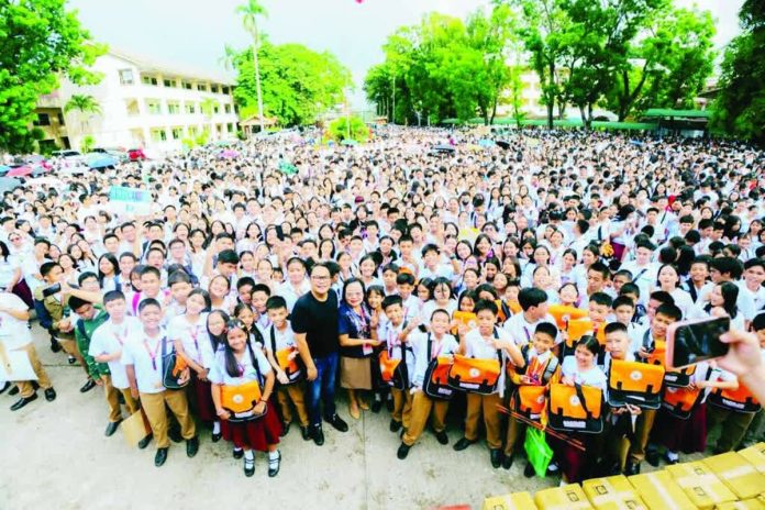 NOHS_supplies_compressed_resized A total of 9,136 students of Negros Occidental High School (NOHS) proudly hold the school bags and basic school supplies they received from the Bacolod City Government during the distribution on August 17. BCCO PHOTO