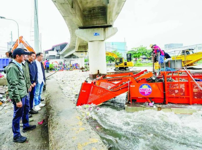 Nation_Marcos_fix_copy_compressed_resized President Ferdinand R. Marcos Jr. on Wednesday personally inspected the ongoing clearing and waste collection operations at the Baclaran River in Parañaque City, which recently drew public attention due to the massive accumulation of garbage following heavy rains brought by the southwest monsoon and recent tropical cyclones. PCO