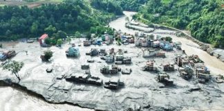 This aerial shot shows the destruction caused by raging floodwaters and a mudslide that hit a village along the Nepal-Tibet border. REUTERS