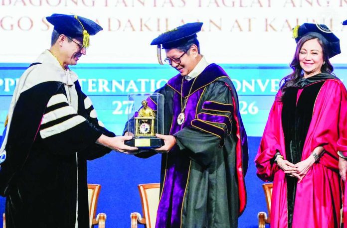 President Ferdinand “Bongbong” Marcos Jr. receives the highest honorary degree conferred by the Pamantasan ng Lungsod ng Maynila, Doctor of Laws, Honoris Causa, during the university’s 58th Commencement Exercises at the Philippine International Convention Center in Pasay City on Aug. 27, 2027. PCO