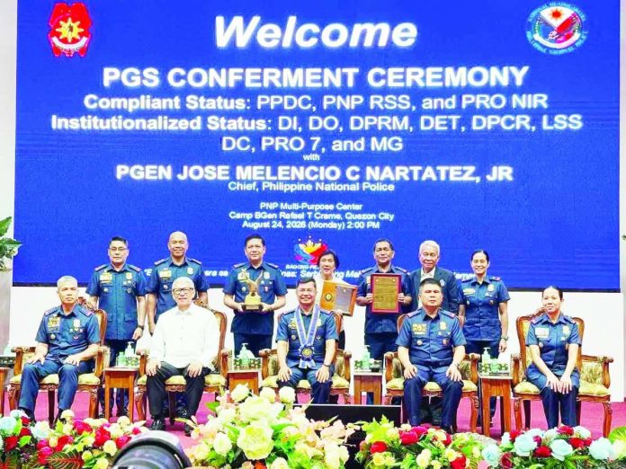 PRO_NIR_award_compressed_resized Police Regional Office-Negros Island Region Director Brig. Gen. Romano Cardiño received the Gold Eagle Award after PRO-NIR attained Compliant Status under the Performance Governance System, with an overall rating of 96.03 percent, during the PGS Conferment Ceremony on August 24 at Camp BGen Rafael T. Crame in Quezon City. PRO-NIR PHOTO