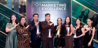 Members of the Palawan Group of Companies team proudly celebrate their wins at the Marketing Excellence Awards Philippines 2026, striking the company’s signature “Happy to Serve You” pose.