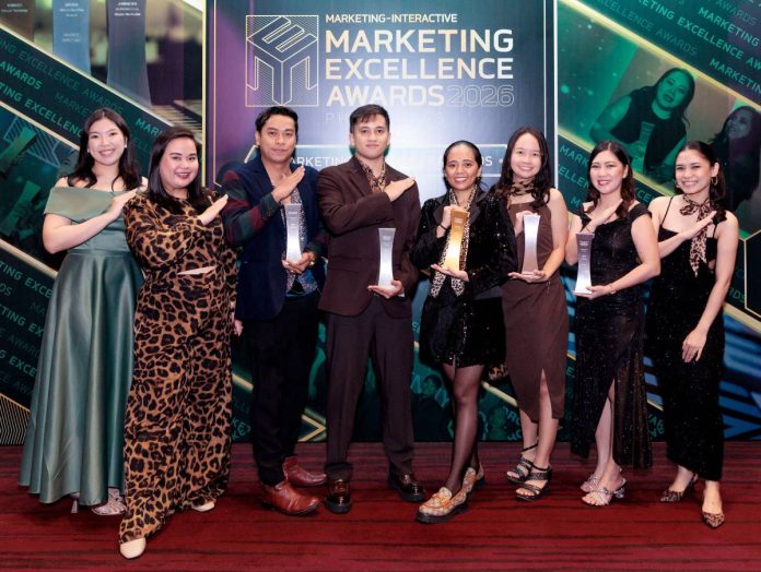 Palawan Group Earns Marketing Excellence Recognition for Advancing Financial Education and Inclusion_5 Members of the Palawan Group of Companies team proudly celebrate their wins at the Marketing Excellence Awards Philippines 2026, striking the company’s signature “Happy to Serve You” pose.
